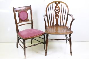 19th century Elm Seated Wheelback Elbow Chair, 55cm wide x 91cm high together with an Edwardian