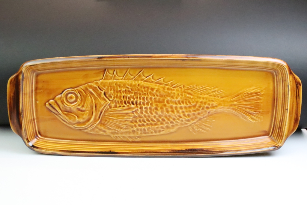 French ceramic fish serving dish of rectangular form, twin-handled, with relief moulded fish