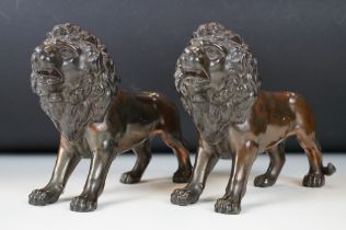 Pair of 19th Century cast spelter lion figurines. Measures 18cm wide.