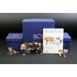 Three boxed Swarovski Crystal Society Tiger / Tiger Cub ornaments with certificates, to include '