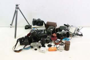 A collection of cameras and photographic equipment to include Minolta, Praktica...etc..