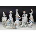 Collection of nine Lladro figurines including various group figures with animals, three Nao
