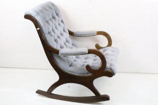 Regency style Wooden Framed Rocking Chair with scrolling arms and blue button upholstery, 67cm