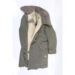 20th Century Swedish military winter coat with khaki green canvas outer and sheepskin lining,