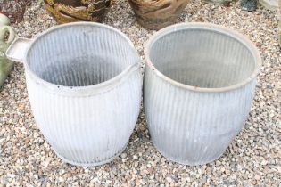 Pair of Ribbed Galvanised Garden Containers, one with a handle and pouring lip, each 55cm high