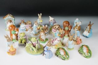 Twenty-two Beswick Beatrix Potter ceramic figurines, all unboxed and marked to the bases. The