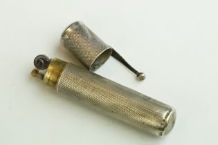 A hallmarked sterling silver English made pocket lighter.