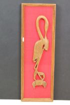 Retro Mid century Teak Carved Picture of a Crane holding Fish on a red fabric background,