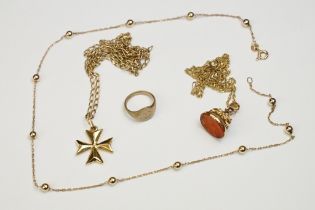 A collection of 9ct gold and yellow metal jewellery to include signet ring, necklaces and pendants.