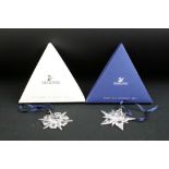 Two boxed Swarovski Crystal Christmas Ornaments with certificates, to include Christmas Ornament