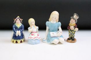 Four Alice In Wonderland porcelain figures to include Royal Worcester Alice candle snuffer, modelled