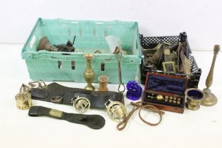 A collection of mixed brassware to include horse brasses, candlesticks, buckles...etc.