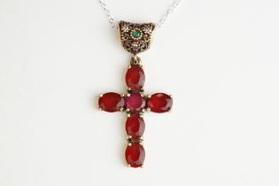 Silver Gilt Crucifix set with Garnet style stones and Emerald cabochons