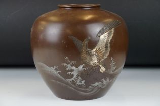 Japanese bronze ovoid vase, decorated with a phoenix perched amongst waves, with gilt & silvered