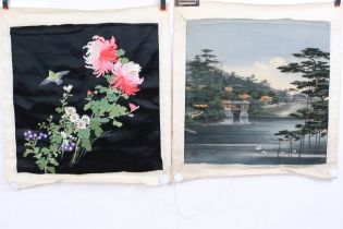 Chinese embroidered silk wall hanging having a black background embroidered with florals together