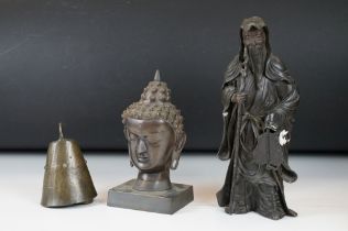 20th century bronze model of a Thai Buddha head, raised on a rectangular base (approx 21cm high),