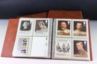 A large collection of Royal Mail PHQ cards / postcards contained within seven albums.