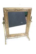 Gilt Brass Swing Mirror Frame, later fitted with a rectangular gilt framed mirror, 39cm wide x