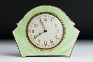 An early to mid 20th century Smith 8-Day green guilloche enamel desk clock.