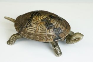 An early 20th century shop counter bell in the form of a Tortoise, wind up mechanism, marked GSS