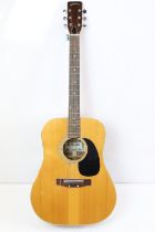 Guitar - Kizo Suzuki acoustic guitar model number 9651. Comes with a Kinsman gig bag