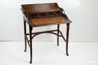 Brights of Nettlebed Mahogany Campaign style Writing Table, the top opening to a fitted interior and