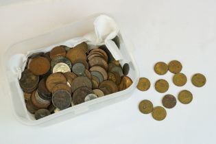 A collection of British and foreign coins to include pre decimal silver and King George III