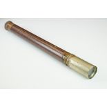 Leather bound single draw hand held telescope. Unmarked. Measures approx 60cm when extended.