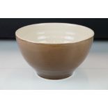 French La Bourguignonne pottery mixing bowl having a brown glaze. Signed to base, marked Made in