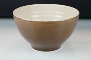 French La Bourguignonne pottery mixing bowl having a brown glaze. Signed to base, marked Made in