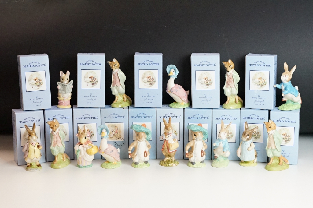 Fifteen Beatrix Potter Beswick ceramic figurines, all in their original boxes. Measures approx 10.