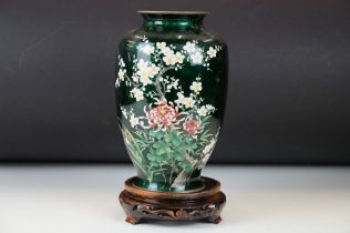 Japanese Ando style Ginbari Cloisonné Vase, decorated with flowers on a green ground, 26cm high