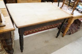 19th century Pine Scrub Top Kitchen Table with drawer to end, and raised on turned tapering legs,