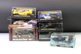 Seven boxed / cased Scalextric slot cars to include C289 Porsche With Lights - Gold, C125 Porsche (