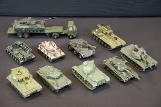 10 Mid 20th C play worn Dinky & Corgi military diecast models to include Dinky AEC Articulated Lorry