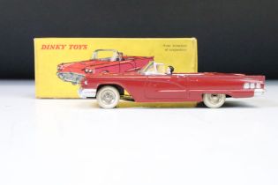 Boxed French Dinky 555 Cabriolet Ford Thunderbird diecast model in dark red, with driver, minimal