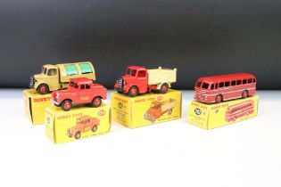 Four boxed Dinky diecast models to include 255 Massey Tunnel Police Van, 282 Duple Roadmaster Coach,