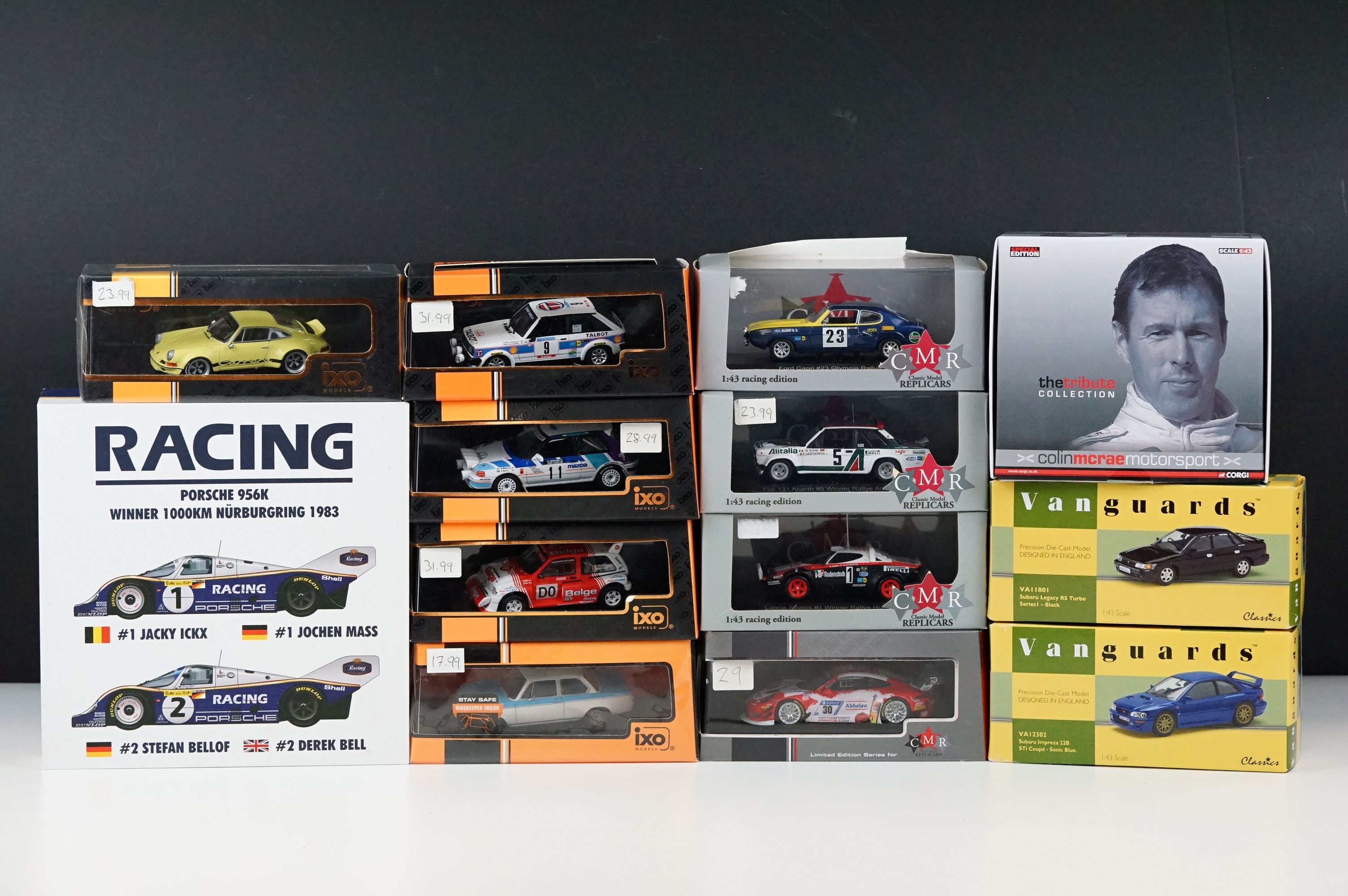 13 Boxed / cased diecast models, 1:43 scale or similar, mostly racing car examples, to include
