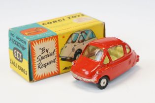 Boxed Corgi 233 Heinkel Economy Car diecast model in red, diecast in a gd play worn condition, box