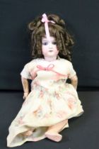 Florodora Armand Marseille bisque headed doll, blue glass eyes, teeth, grubby limbs but gd