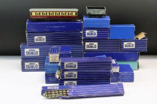 Over 25 boxed Hornby Dublo items of rolling stock to include D1 Corridor Coach, D12 Corridor