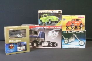 Four boxed Revell plastic model kits to include Trucks Of The World 1/25 Kenworth Aerodyne (no. 7413