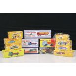 13 boxed Dinky Toys Atlas Editions diecast models to include 514 Guy Van, 512 Guy Flat Truck, 901