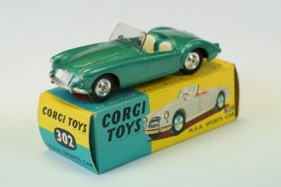 Boxed Corgi 302 MGS Sports Car diecast model in metallic green, diecast ex with ex windscreen, box