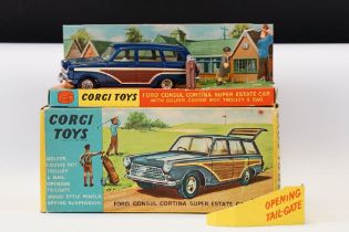 Boxed Corgi 440 Ford Consul Cortina Super Estate Car diecast model complete with 2 x figures, golf