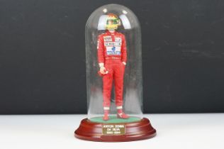 Cased Sean Mills Ayrton Senna model figure in glass dome and wooden base, vg
