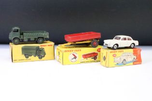 Three boxed Dinky diecast models to include 144 Volkswagen 1500 in white with red interior (
