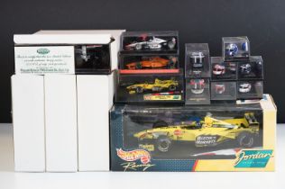 15 Boxed / cased F1 related diecast models and helmets to include 4 x cased Heritage Classics, 1/