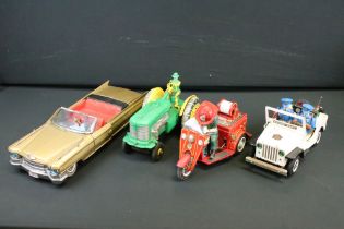 Four play worn mid 20th C battery-operated tinplate models to include 2 x T.N Nomura of Japan (