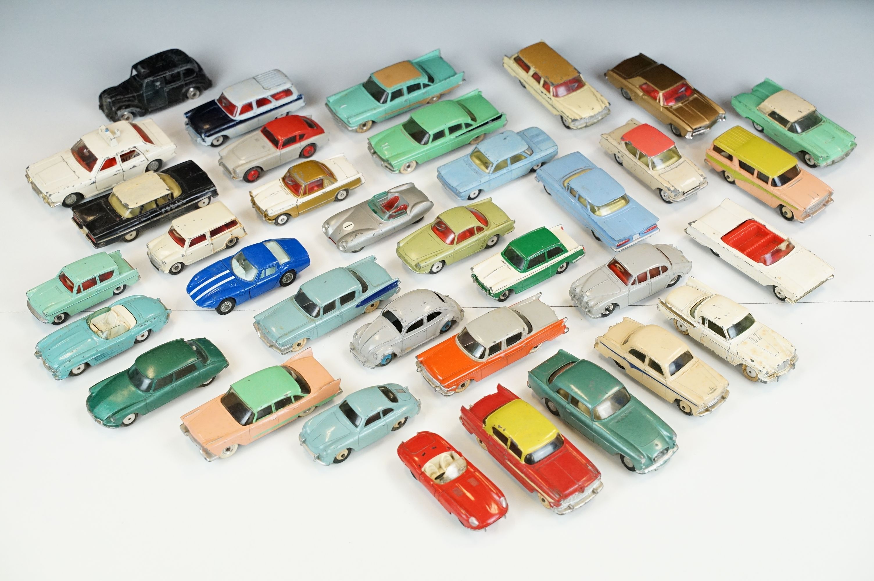 35 Mid 20th C play worn diecast models to include Dinky, Triang & Corgi examples, featuring Triang